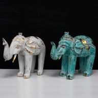 Éléphant en bois sculpté - Or blanc