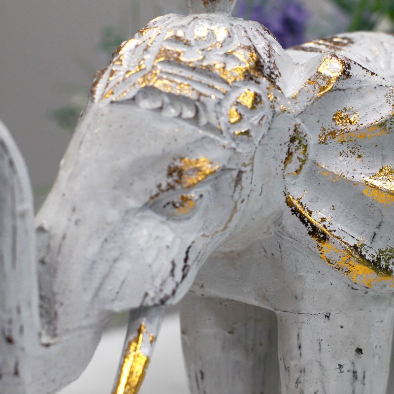 Éléphant en bois sculpté - Or blanc