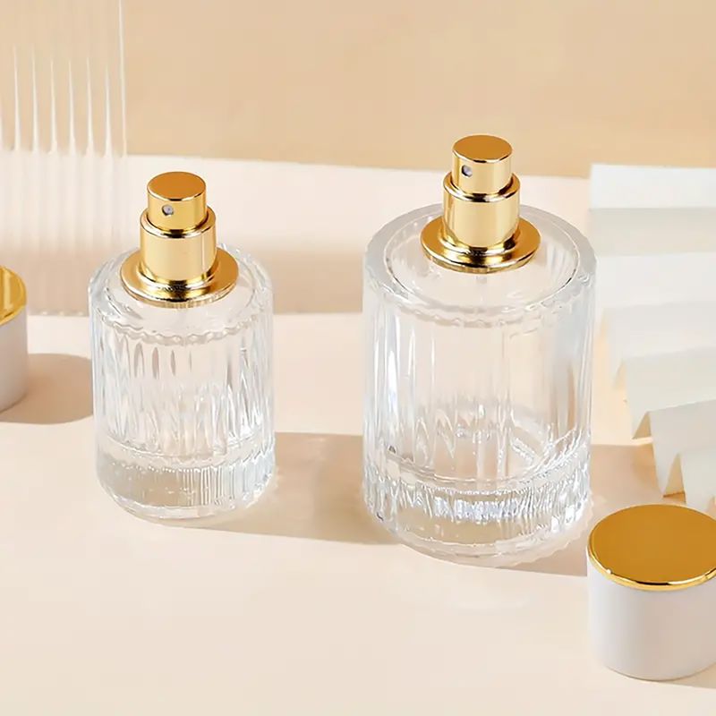 Bouteille Ronde Nervurée de 50ml, Vaporisateur et Bouchon - Rose Poudré