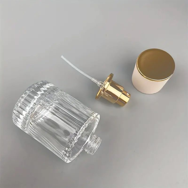 Bouteille Ronde Nervurée de 50ml, Vaporisateur et Bouchon - Rose Poudré