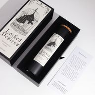 Locked Desires bougie noire avec couvercle en liège dans sa boîte-cadeau