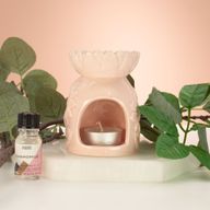 Brûleur d'huile en céramique au motif tournesol - rose pastel