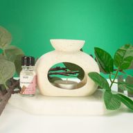 Brûleur d'huile en céramique zen - galet ovale - blanc cassé moucheté