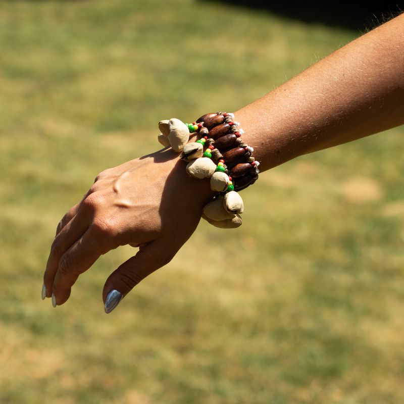 Shaker à main en coquille Kenari - Bracelet à grelots (15 pièces)