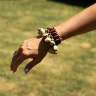 Shaker à main en coquille Kenari - Bracelet à grelots (15 pièces)