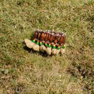 Shaker à main en coquille Kenari - Bracelet à grelots (15 pièces)