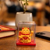 Mini chat porte-bonheur fonctionnant à l'énergie solaire dans une boîte - Jaune