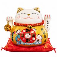 Chat Porte-Bonheur en Céramique à Patte Mobile – Doré sur Coussin (piles non incluses)