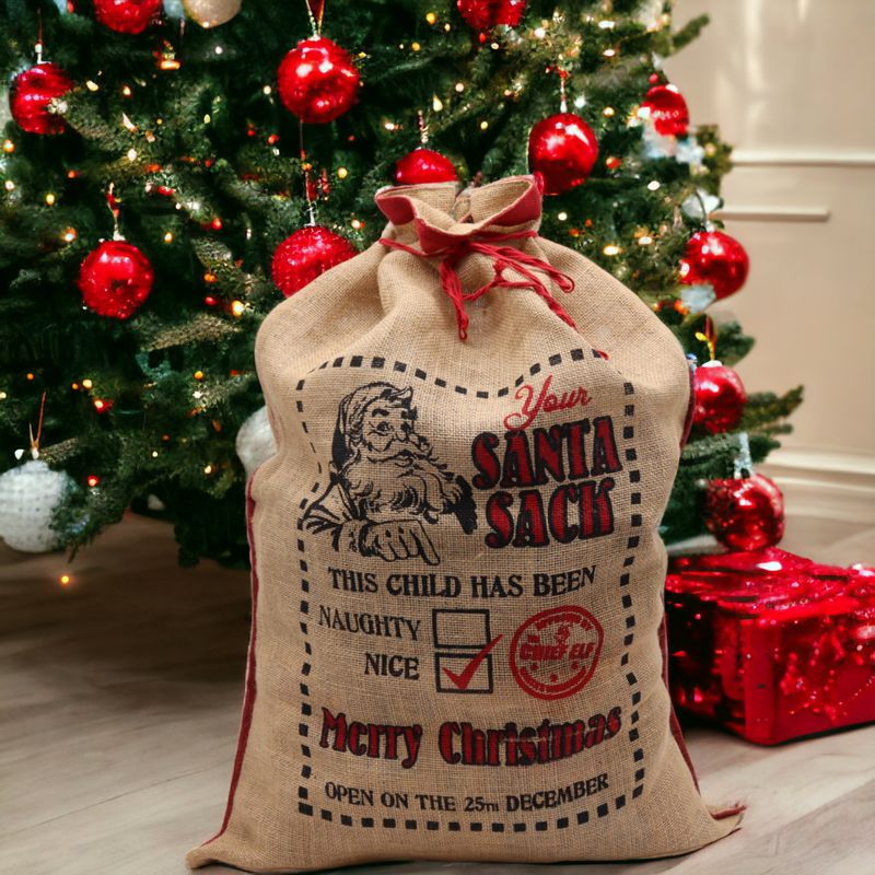 Sacs en jute de Noël "This Child Has Been.. Nice!"